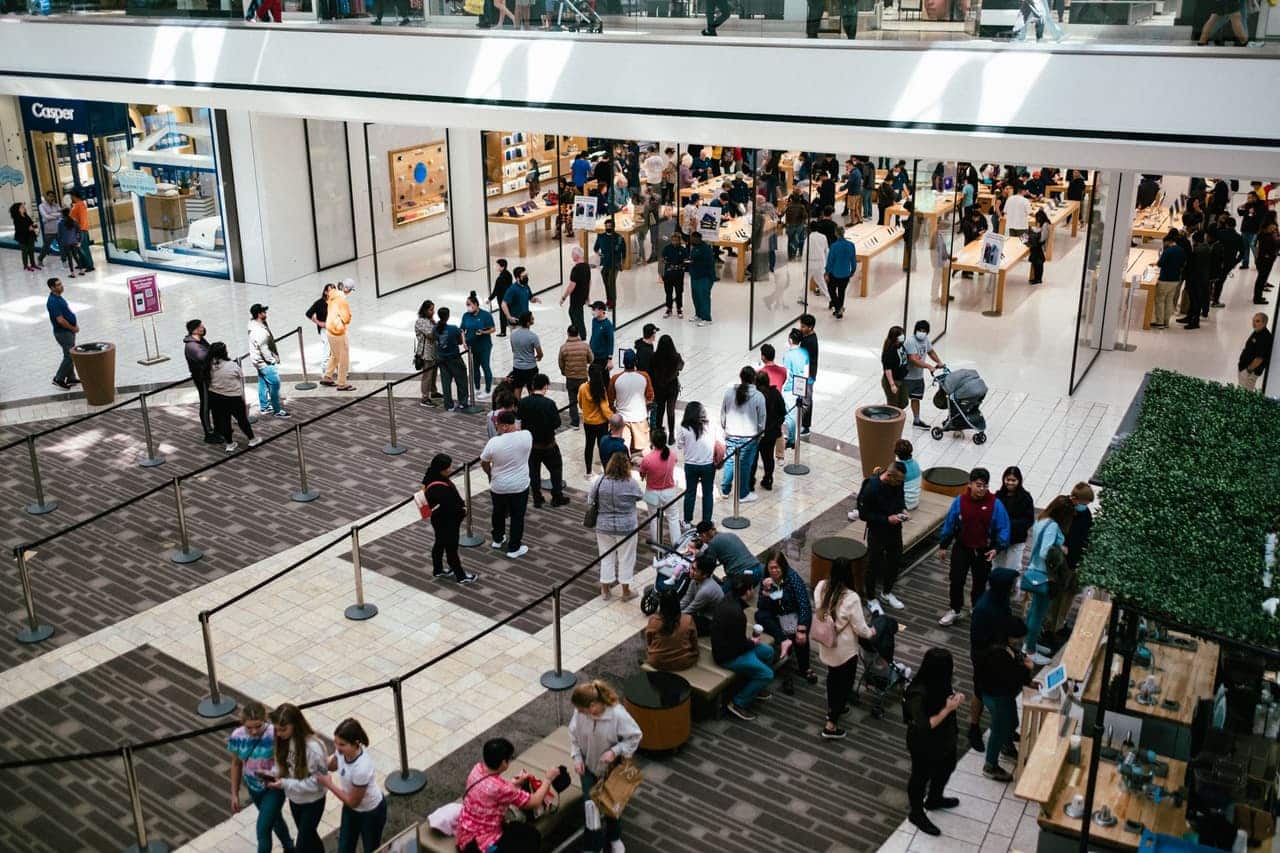 A busy retail store full of customers